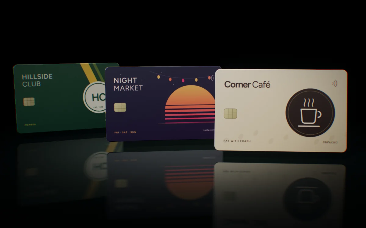 Three sample custom printed Cashu Cards: a café, a night market and a members' club.